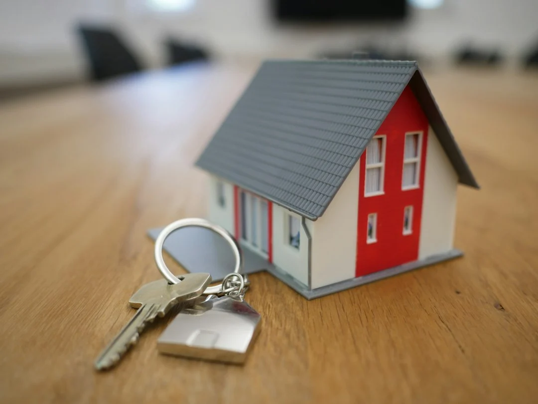 House keys and paperwork symbolizing a mortgage preapproval process